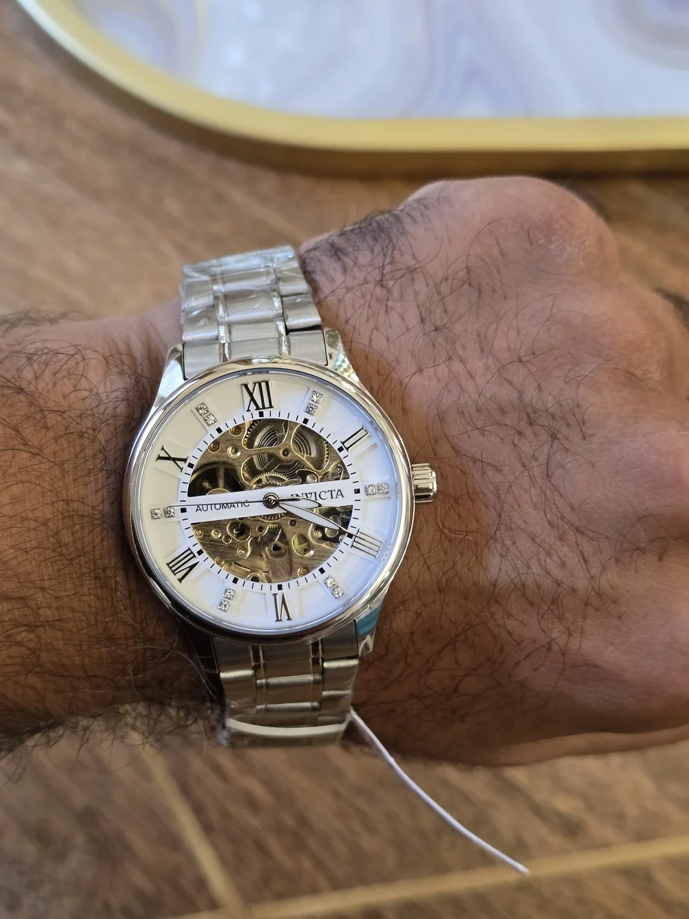 Invicta Men's Silver Skeleton Dial Automatic Watch with White Accents